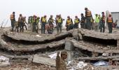 Teenager pulled out alive 50 hrs after factory collapse in Pak