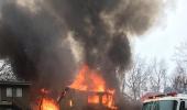 US: 9 killed as plane crashes into apartment in US