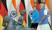 'Real business of diplomacy' as PM, Germany's Merkel hold talks