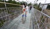 Don't look down! Terror at 3,500 feet as glass walkway cracks in China