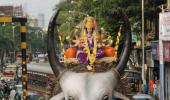 PHOTOS: Devotees bring home Maa Durga