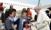 'You are not alone': Pope brings 3 refugee families from Greece to Rome