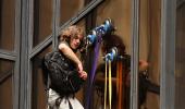 Suction-cup daredevil scales Trump Tower to meet him!