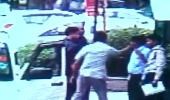 Caught on CCTV: Culture minister's security thrashes society guards