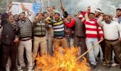 Sanitation workers block roads in Delhi, throw traffic out of gear