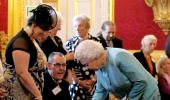 Queen's dogs eat dinners served by butlers on silver platters