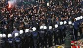 Police fire water cannon at hooligans at Brussels shrine