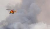 Canadian wildfires grow tenfold; rescuers pray for rain