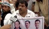 Vadra on Congress 'democracy march' posters, BJP calls it 'dynasty march'