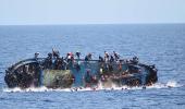 Migrant boat sinks off Libyan coast, 117 bodies found