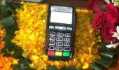 Parliament hears Modi's Mann ki Baat, goes cashless