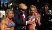 PHOTOS: 'Trump' takes Times Square with a band of bikini-clad babes