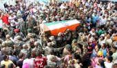 PHOTOS: Nation bids tearful adieu to its fallen heroes