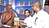 Dadlani gives a coconut to Jain monk Tarun Sagar, then apologises