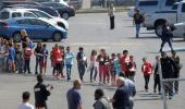 Teacher, student killed in US school shooting