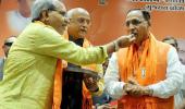 Will Vijay Rupani keep his job after a close fight?