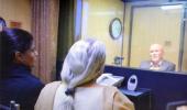 In Islamabad, Jadhav meets wife, mother -- from behind glass screen