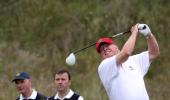 Trump retweets video of him hitting Clinton with a golf ball