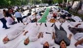 UP farmers perform shavasana in protest