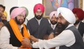 Amarinder keeps home portfolio; Sidhu gets local govt