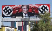 Now, a US billboard shows Trump with swastika-like symbols