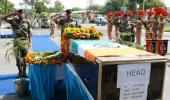 Martyred BSF jawan cremated after Adityanath speaks to family