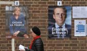 France goes to the polls as country decides between Macron or Le Pen