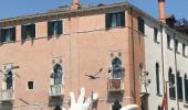 PHOTOS: Why giant hands are emerging from the water in Venice