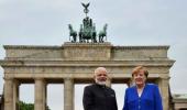 PM poses with Merkel at Brandenburg Gate before leaving Berlin