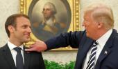 Hair you go: Trump brushes dandruff off 'perfect' Macron