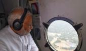 PM surveys flood-hit Kerala, grants Rs. 500 cr emergency aid