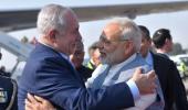 With hugs and handshakes, Netanyahu begins India vist