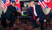 Kim vows complete denuclearisation at historic summit with Trump