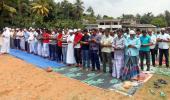 Muslims offer Friday prayers under military protection in Sri Lanka after riots