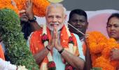 Modi warms up to Deve Gowda, attacks Rahul for 'insulting' ex-PM