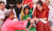 With puja and roadshow, Sonia, Smriti file nominations