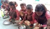 UP schoolchildren eat roti-salt as mid-day meal