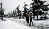 PHOTOS: Heavy snowfall paints Kashmir white