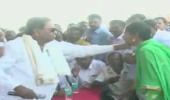 Siddaramaiah snatches mike during wordy duel with woman party worker