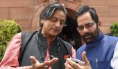 Caption this: What's Tharoor telling Naqvi?