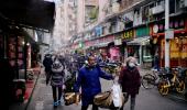 A year on, markets bustling in Wuhan