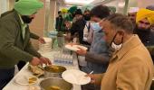 Union ministers share farmers' langar food during meet