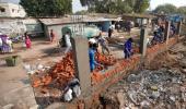 Ahmedabad builds Trump wall to keep slums out of sight