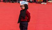 Kejriwal swearing-in: 'Baby Mufflerman' wins hearts