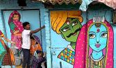 Colourful murals bring a smile to a Delhi slum