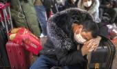 China shuts down 13 cities as coronavirus toll rises