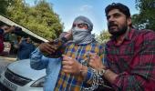 Delhi riots: Man who pointed gun at cop seeks release