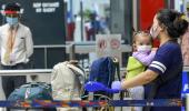 PIX: Indians catch their first flight after 2 months