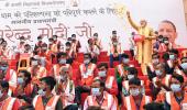 Modi showers floral petals on Kashi corridor workers