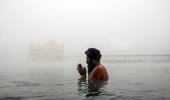 Golden Temple Wrapped In Fog